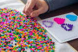 4cd36pn3q13d18rlppm0g4c06g-13445_Bertie_Fuse_Bead_Tub_Bright_Pink_3000pc_Front_Lifestyle.jpg