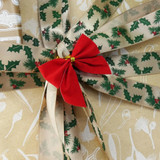 o6kivmetft2a9d38npklcjst47-14842-Chistmas-Velvet-Bow-Bauble-Toppers-Red-10pc-3-lifestyle-christmas-present 2.jpg