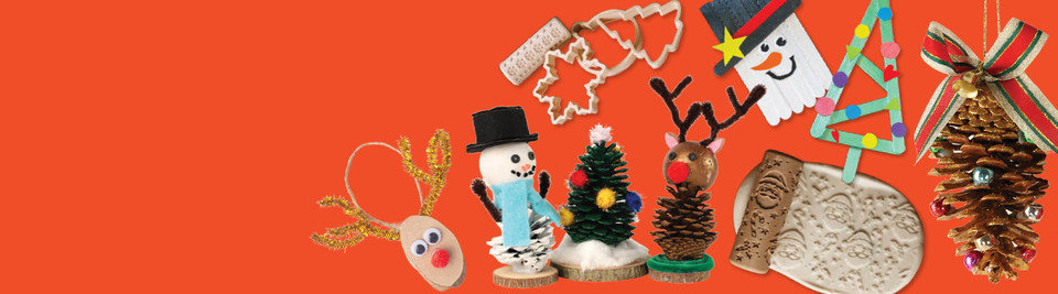 Handmade Christmas decorations made from pinecones, wood slices and popsicle sticks, including a snowman and reindeer