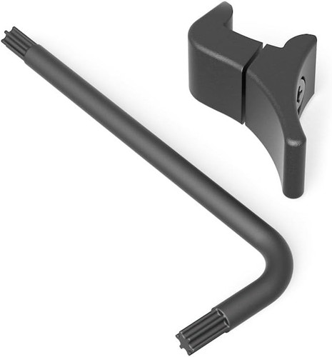 An angled perspective shot of the Leupold VX-5HD throw lever mechanism and mounting tool over a white backdrop. The black scope lever component is shown from behind to highlight the integrated star-head fastening screw, positioned next to the L-shaped security adjustment tool.