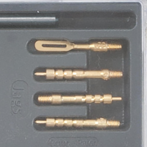 Top view of four brass cleaning tips arranged vertically inside a custom foam tray compartment