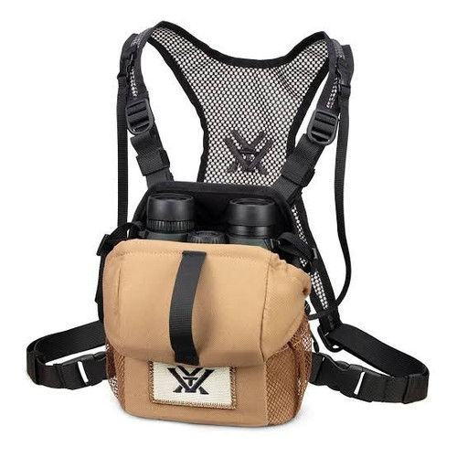 Three quarter front view of a tan Vortex GlassPak Sport binocular harness showing the main pouch connected to black mesh shoulder straps
