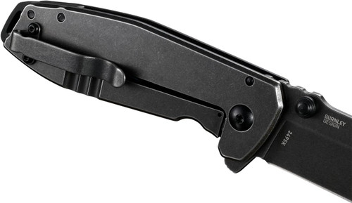 Close-up angled view of a closed black CRKT Squid XM folding knife showing its metal pocket clip
