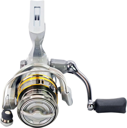 Front three-quarter angled view of the Okuma Avenger AV-2500B spinning reel, highlighting the gold-accented aluminum spool.