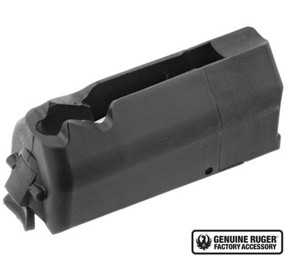 Front angle view of a matte black 5-round flush-fit factory magazine for the Ruger American Rifle, highlighting the locking latch and top cartridge positioning groove.