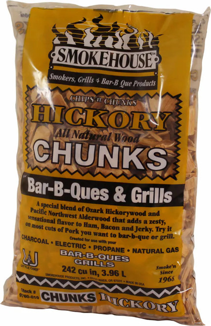 Front view of a clear bag of Smokehouse Products Premium Hickory Wood Smoking Chunks featuring a yellow label