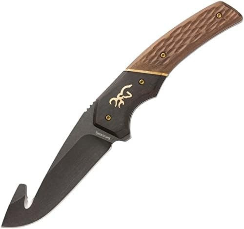Angled view of a Browning Primal fixed blade hunting knife featuring a gut hook on a white background
