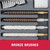 Close-up of various bronze wire brushes and cleaning swabs arranged inside a gun maintenance kit