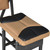Close-up angled view of the padded tan shooting bench seat featuring a curved black non-slip insert comfort cushion