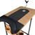 Top angled view of the tan tabletop surface showing a black padded rest cushion and an integrated micro-adjust metal yoke