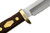 Close-up view focusing on the brass finger guard and inlaid brand logo shield of the Old Timer hunting knife