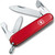 Classic red Victorinox Recruit Swiss Army multi-tool pocket knife with multiple stainless steel blades extended