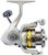 Left side profile view of the Okuma Avenger AV-2500B reel showing the handle attachment side and smooth metallic silver finish.