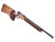 High angle right side perspective view of the CZ 457 Varmint MTR .22 LR match rifle showcasing the flow of the oiled walnut stock grain.