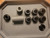 Two Tone Raw Titanium Disassembled Into Individual Parts