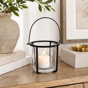 Cozy Scandinavian-inspired candlelit vignette