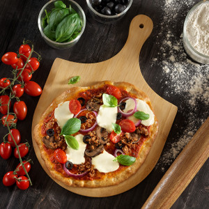 Bamboo pizza peel paddle board serving a fresh pizza; tapered edge and handle with hanging hole Bamboo pizza peel paddle board serving a fresh pizza; tapered edge and handle with hanging hole
