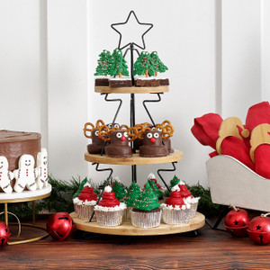 Tree-shaped three-tier serving stand with bamboo shelves and metal star, styled with holiday cupcakes and treats