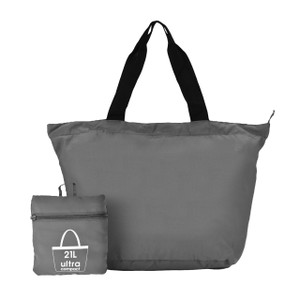 The lava gray Navigator Packable Tote is shown fully expanded, with its compact, folded-up storage pouch displayed in front to illustrate its convenient, packable design. The lava gray Navigator Packable Tote is shown fully expanded, with its compact, folded-up storage pouch displayed in front to illustrate its convenient, packable design.