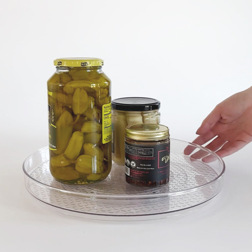 Hand spinning clear lazy susan organizer with pickle jars; non-slip base