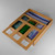 The bamboo bag organizer is displayed with its convenient sliding lid partially open, illustrating how easy it is to load and refill with boxes of storage bags.