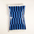 A single reusable ice pack with a classic blue and white striped pattern is displayed against a white background.