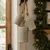 Cozy holiday vignette with metallic ornaments