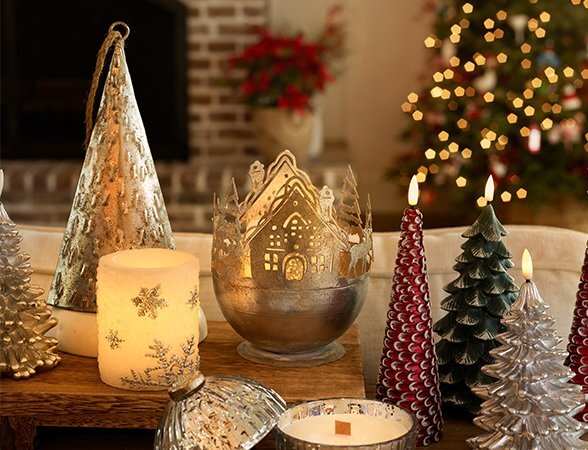 Festive Christmas decor featuring ornaments, garlands, and holiday-themed gifts on a cozy backdrop