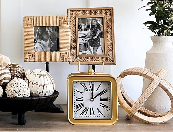 Fall-inspired home décor accents including pillows, vases, and seasonal touches