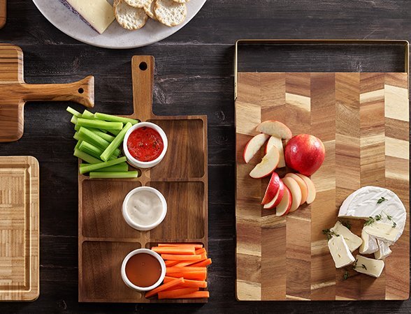 Natural wood kitchen accessories and decor in warm, earthy tones