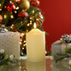 Festive 12.5cm Battery Operated Wax Firefly Pillar Candle With Timer Ivory 1