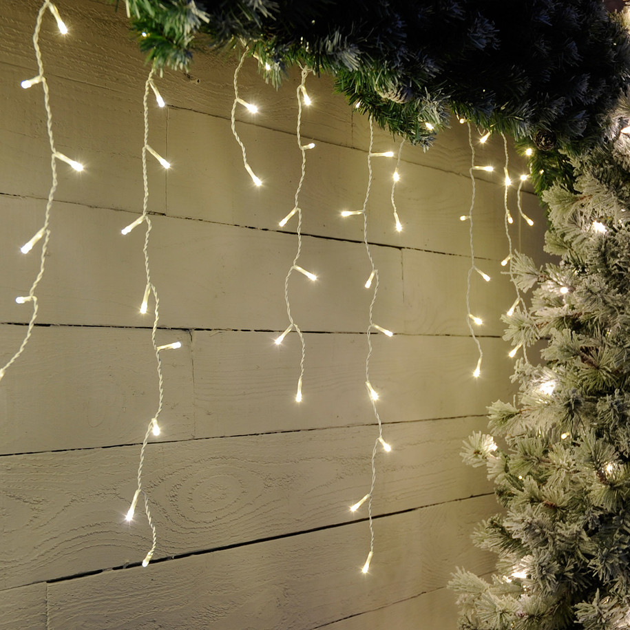 Festive 17.8m Indoor & Outdoor Snowing Effect Icicle Christmas Lights 720 Warm White LEDs 1