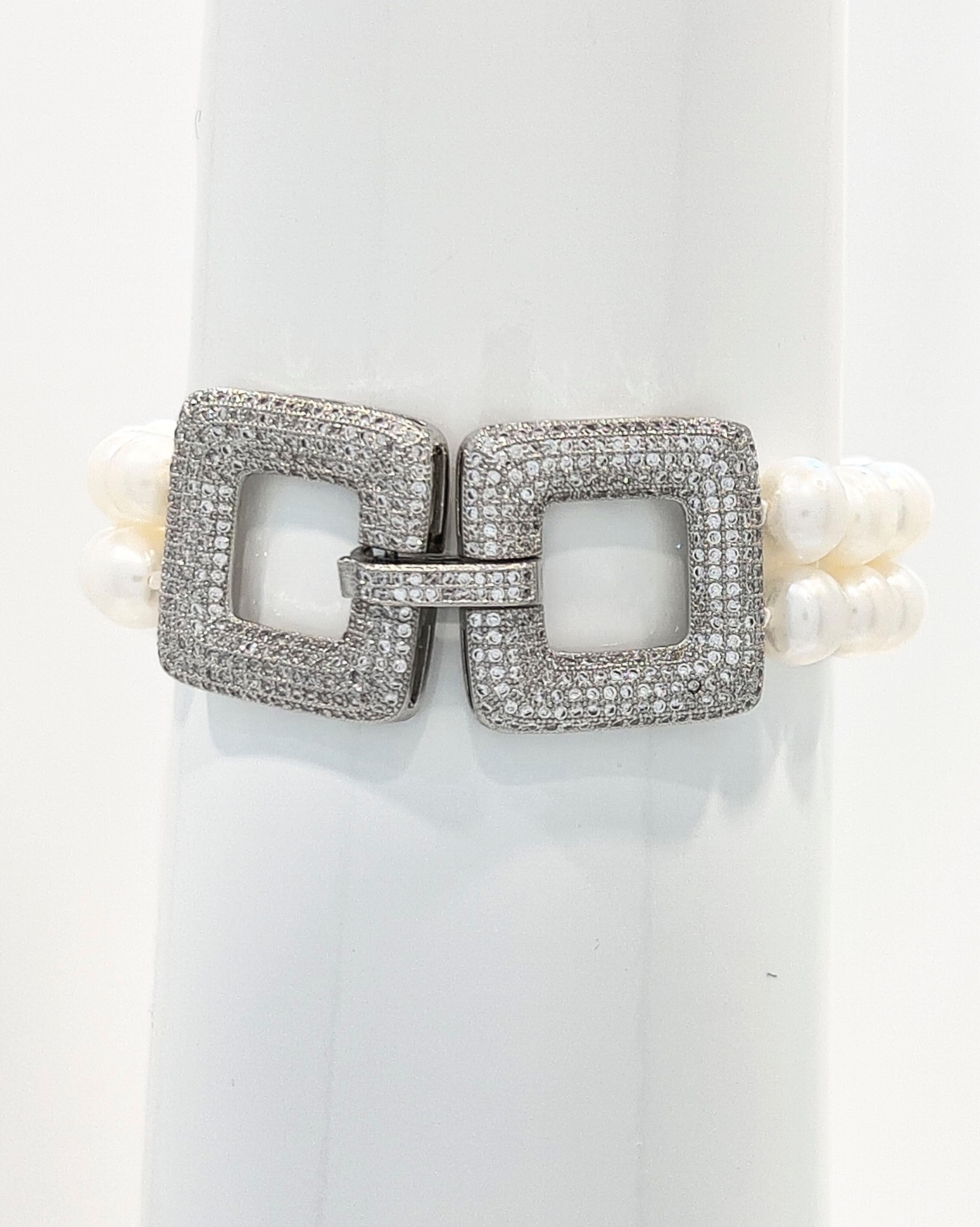 Classic round pearl bracelet with double white strand and square crystal clasp