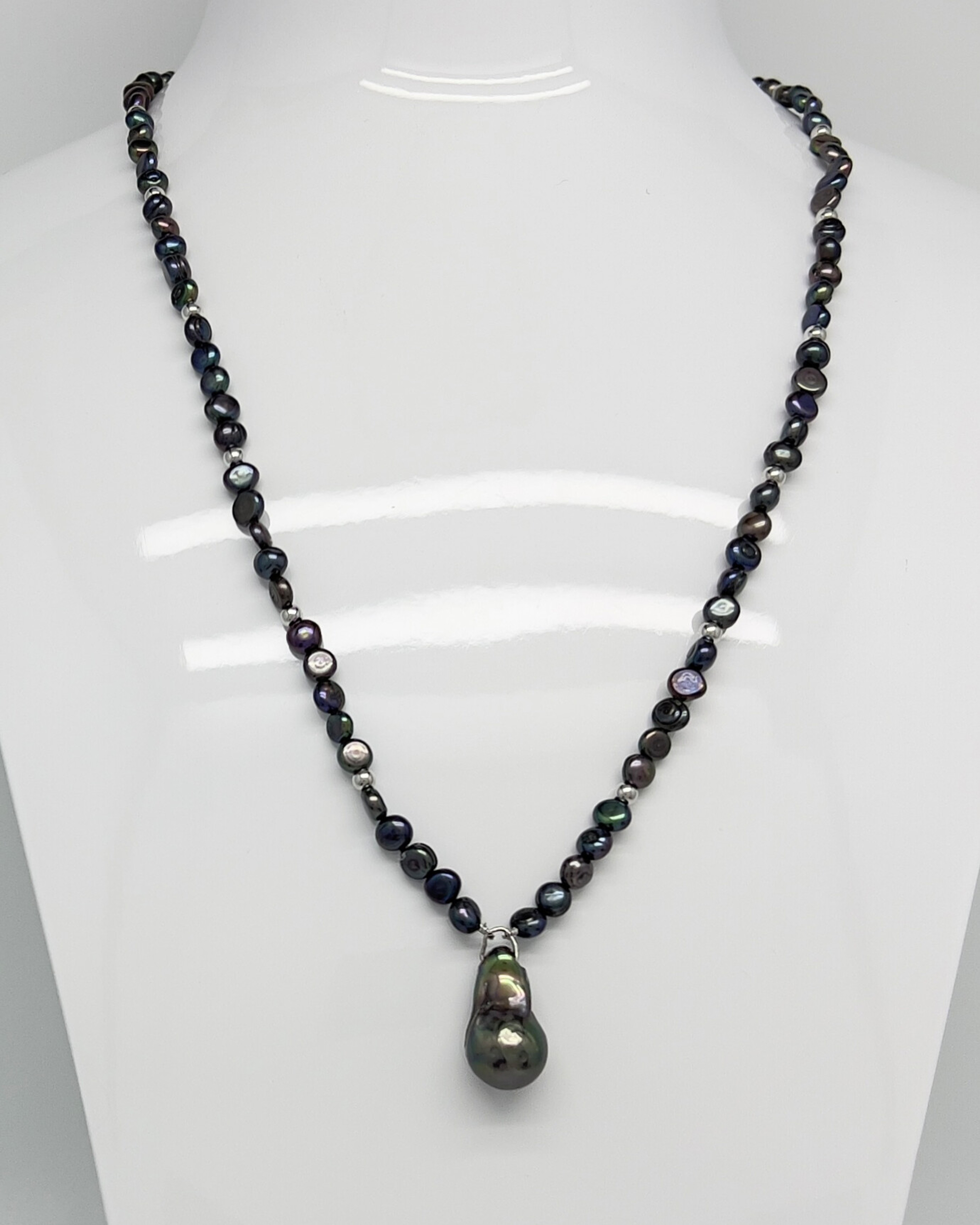 Dark baroque pearl toggle pendant necklace with a delicate pearl chain and rhodium-plated sterling silver toggle closure