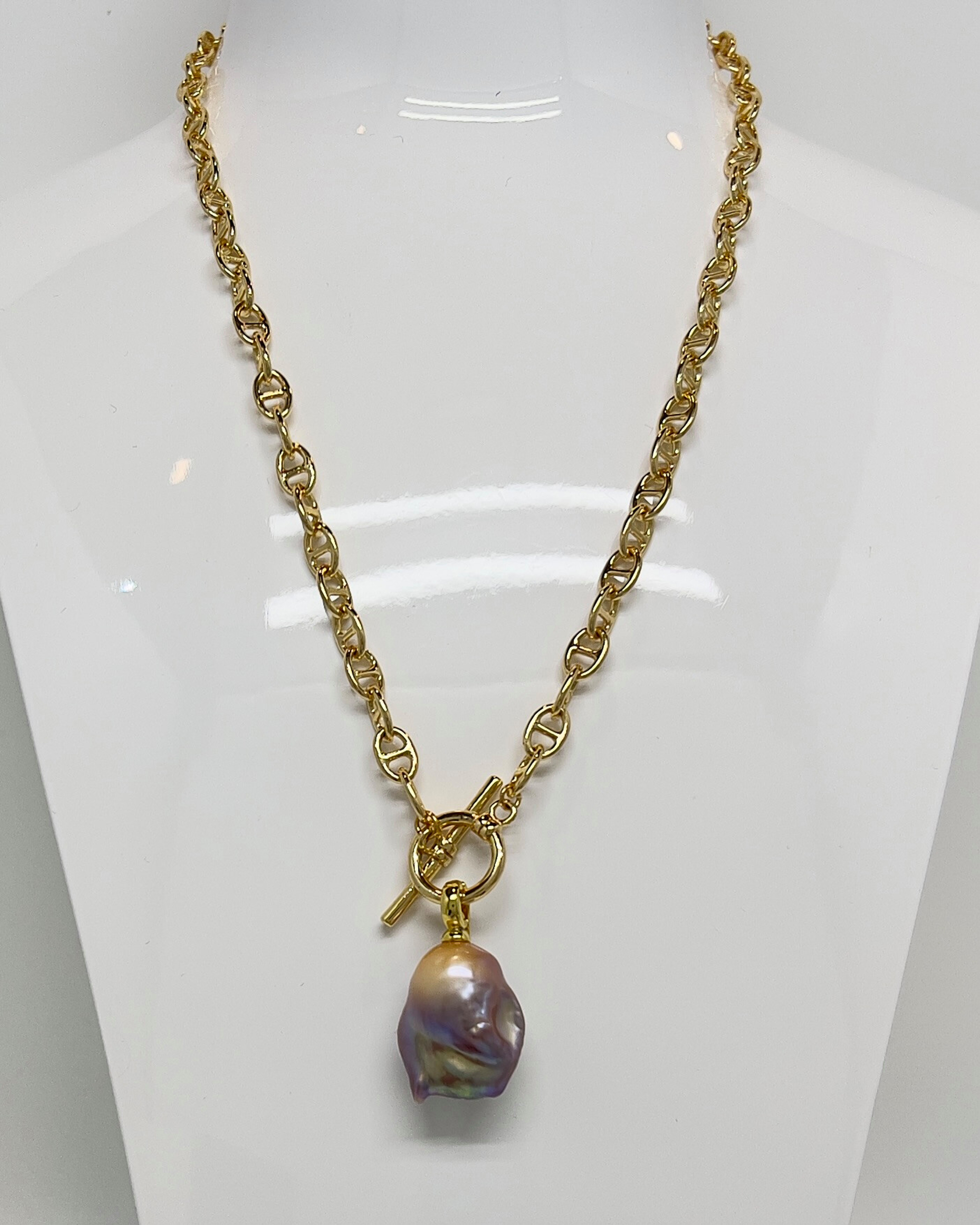 Classic Toggle Pendant Necklace with a striking purple large baroque pearl suspended from a refined gold-plated silver chain