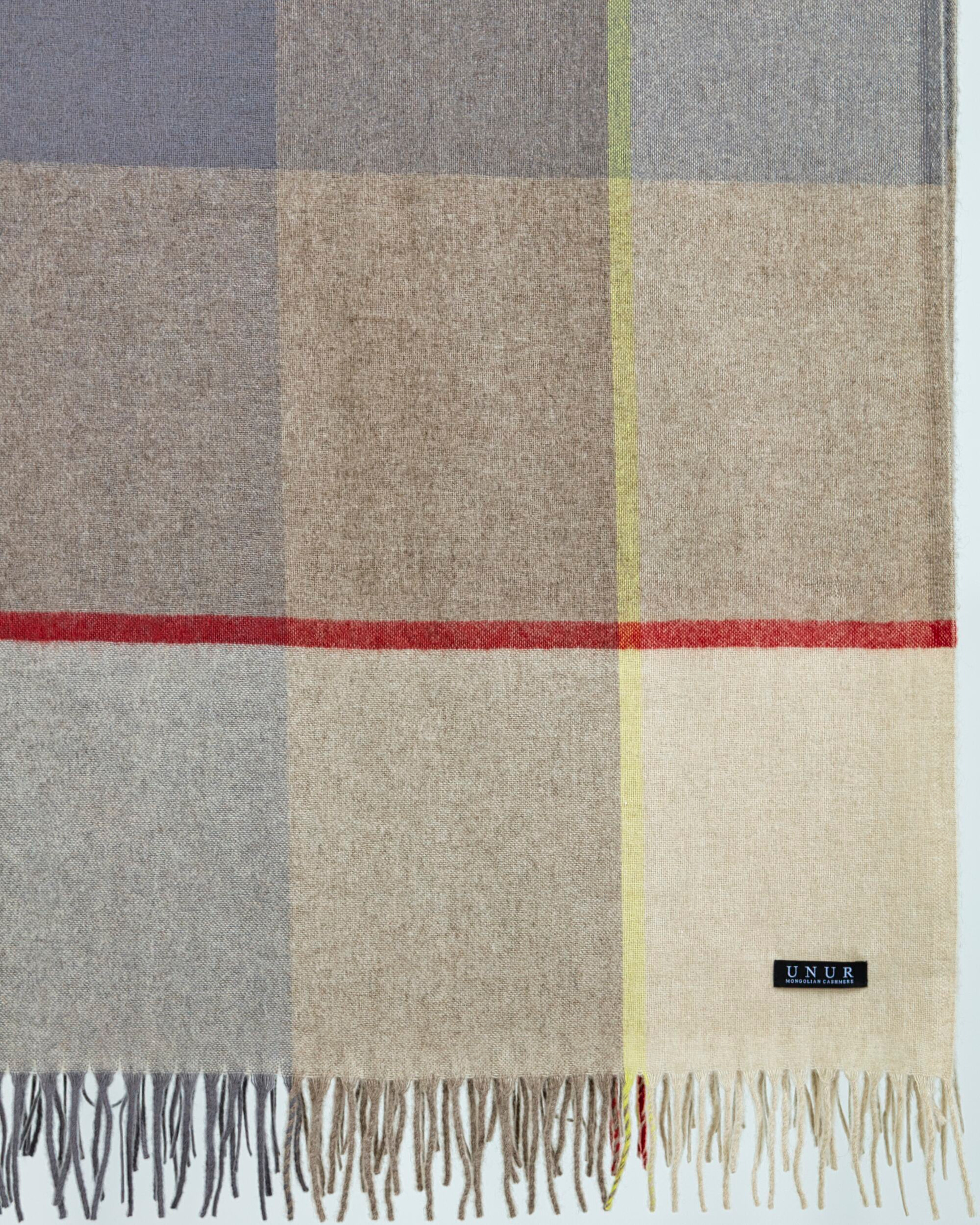 Close-up of soft cashmere checked pattern blanket