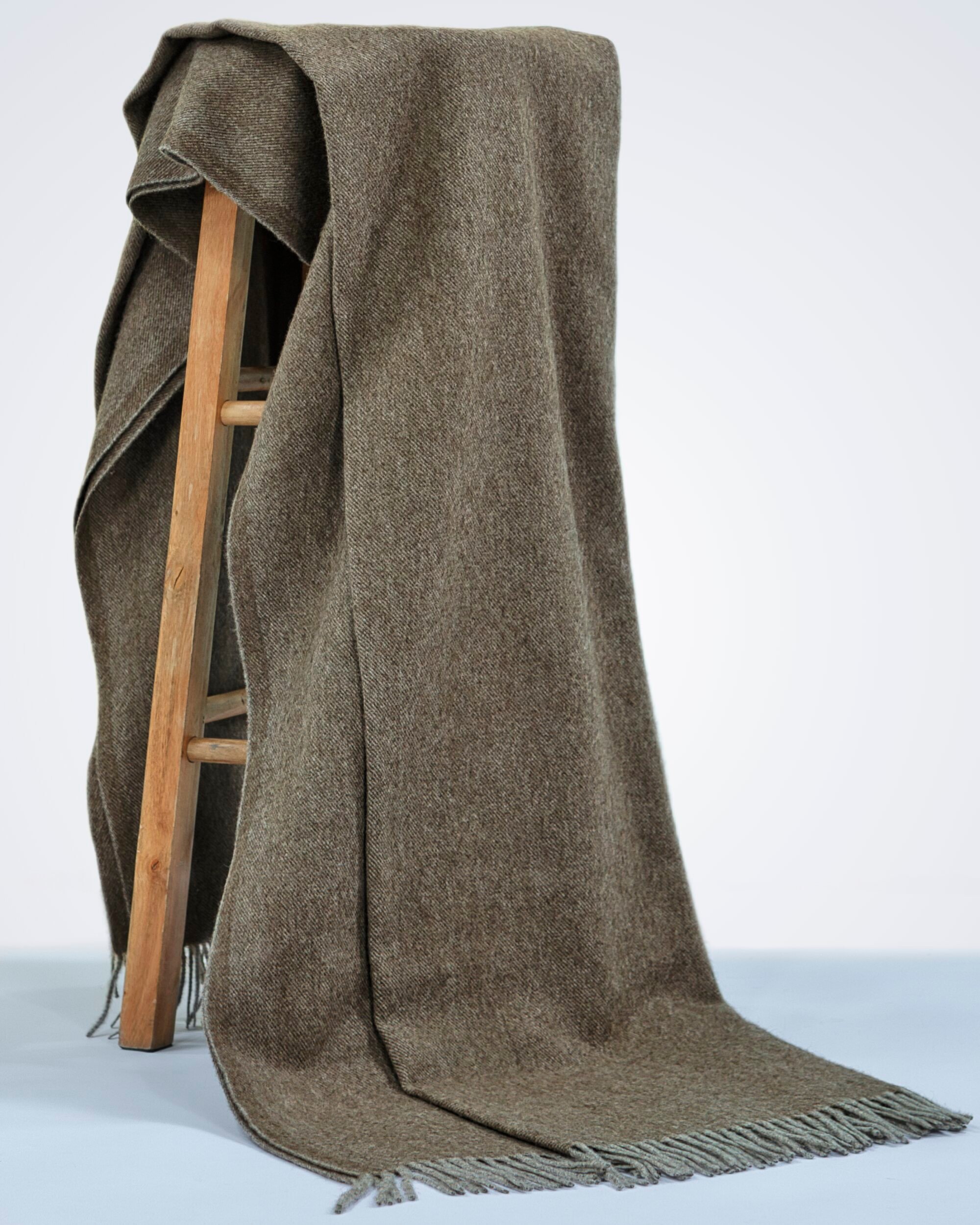 natural brown yak wool blanket draped over a chair