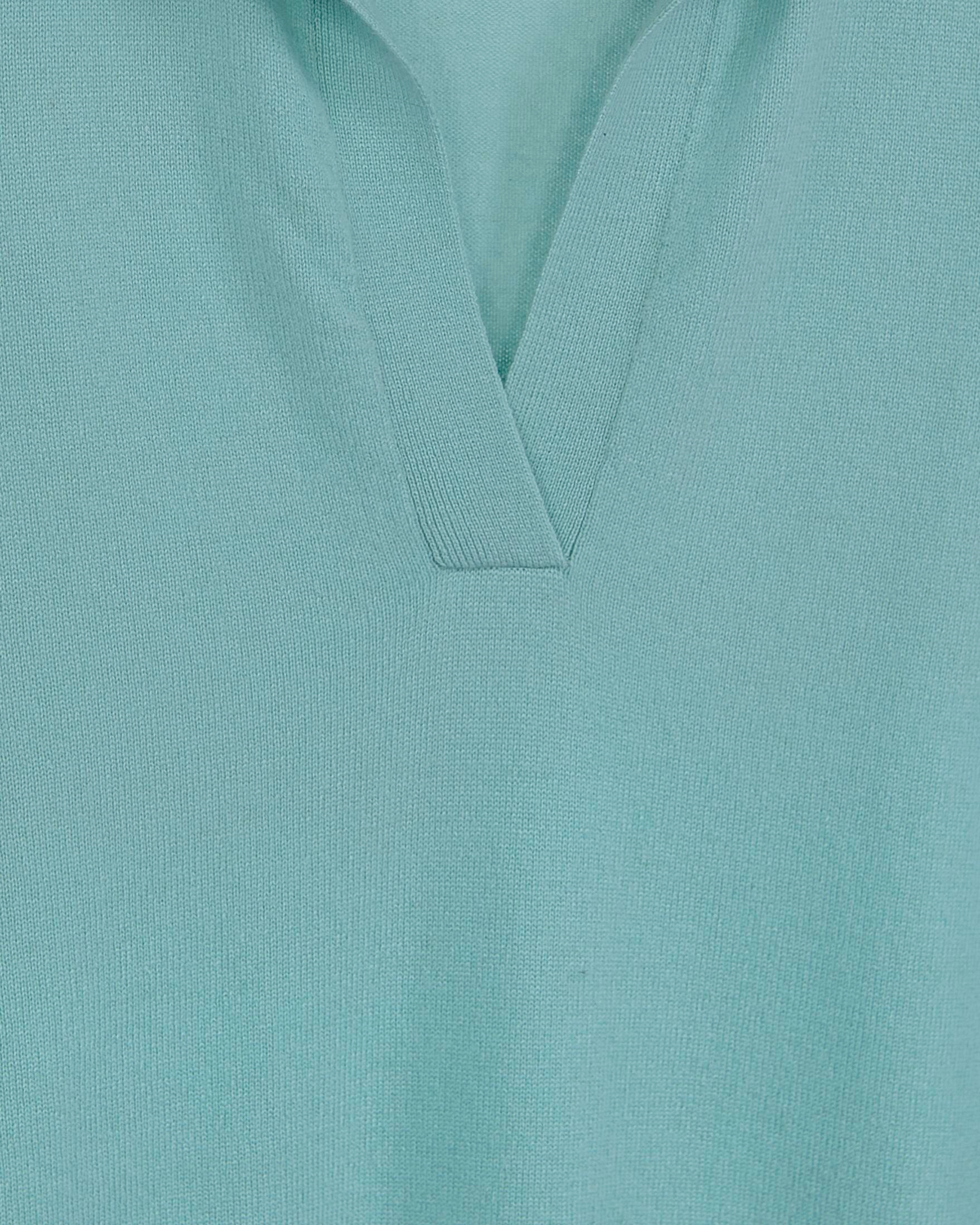 Close up of a mint green fine weave cashmere jumper
