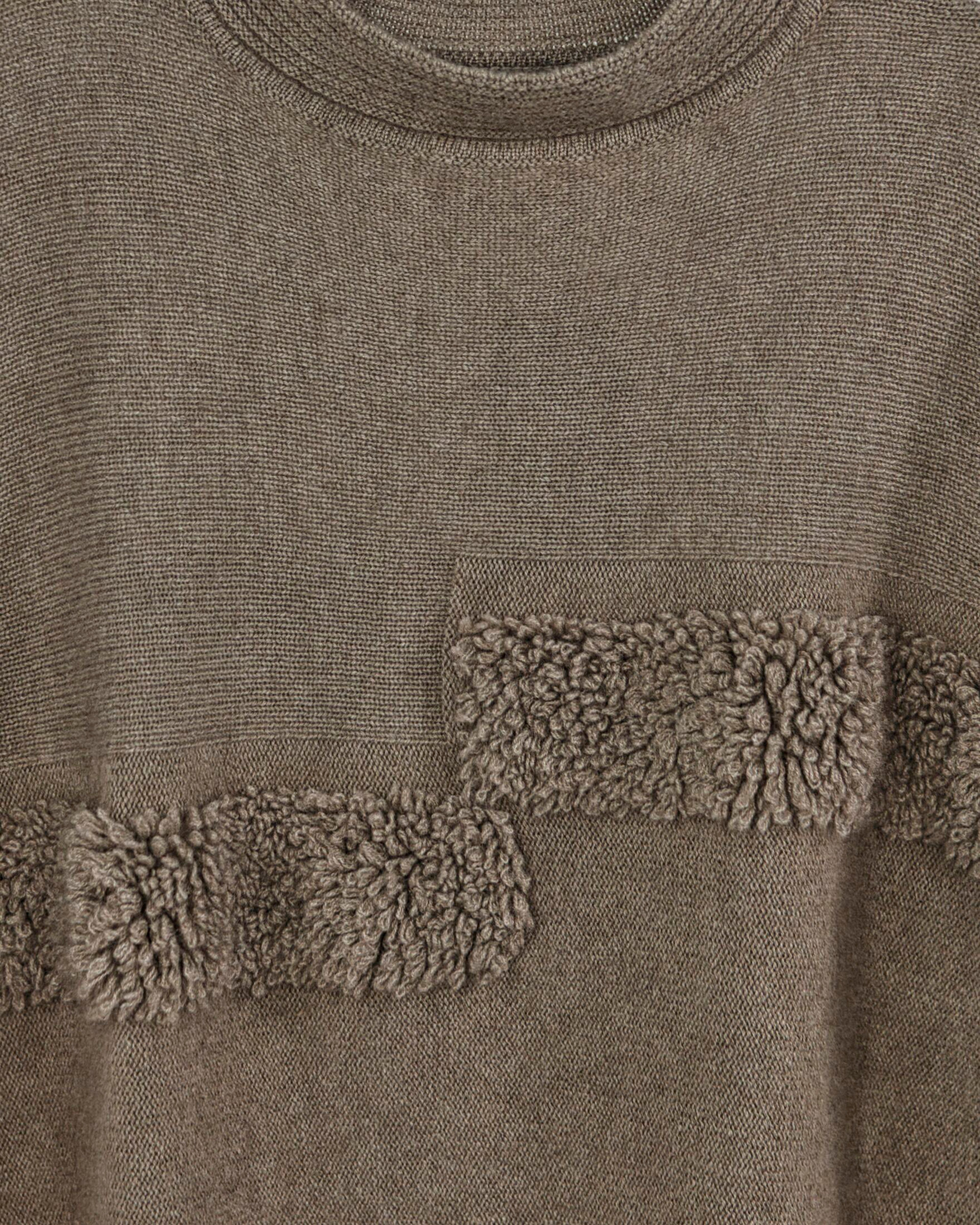 Close up of natural brown ribbed cashmere with faux fur trim