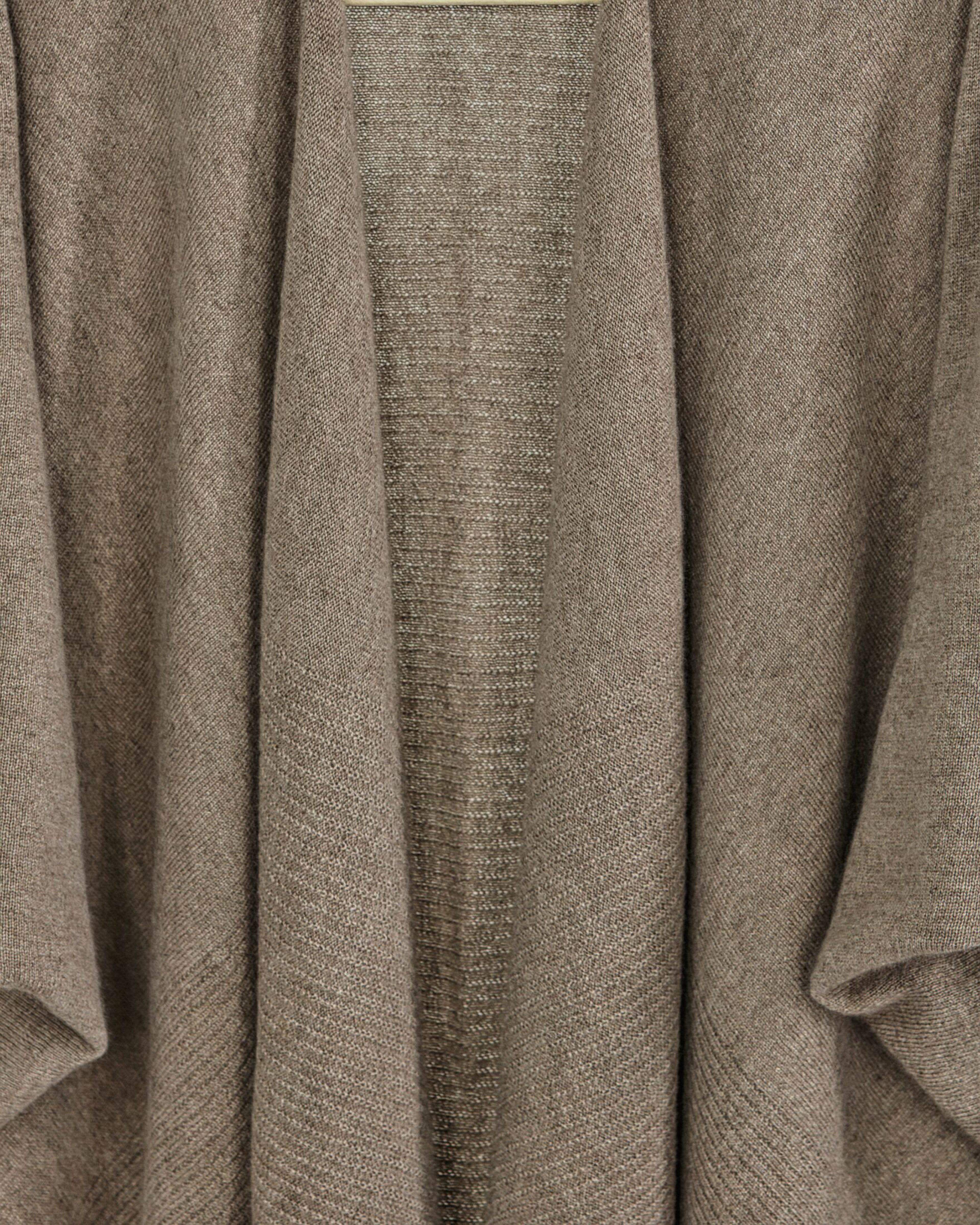 Close up of natural brown cashmere poncho with ruched sleeves