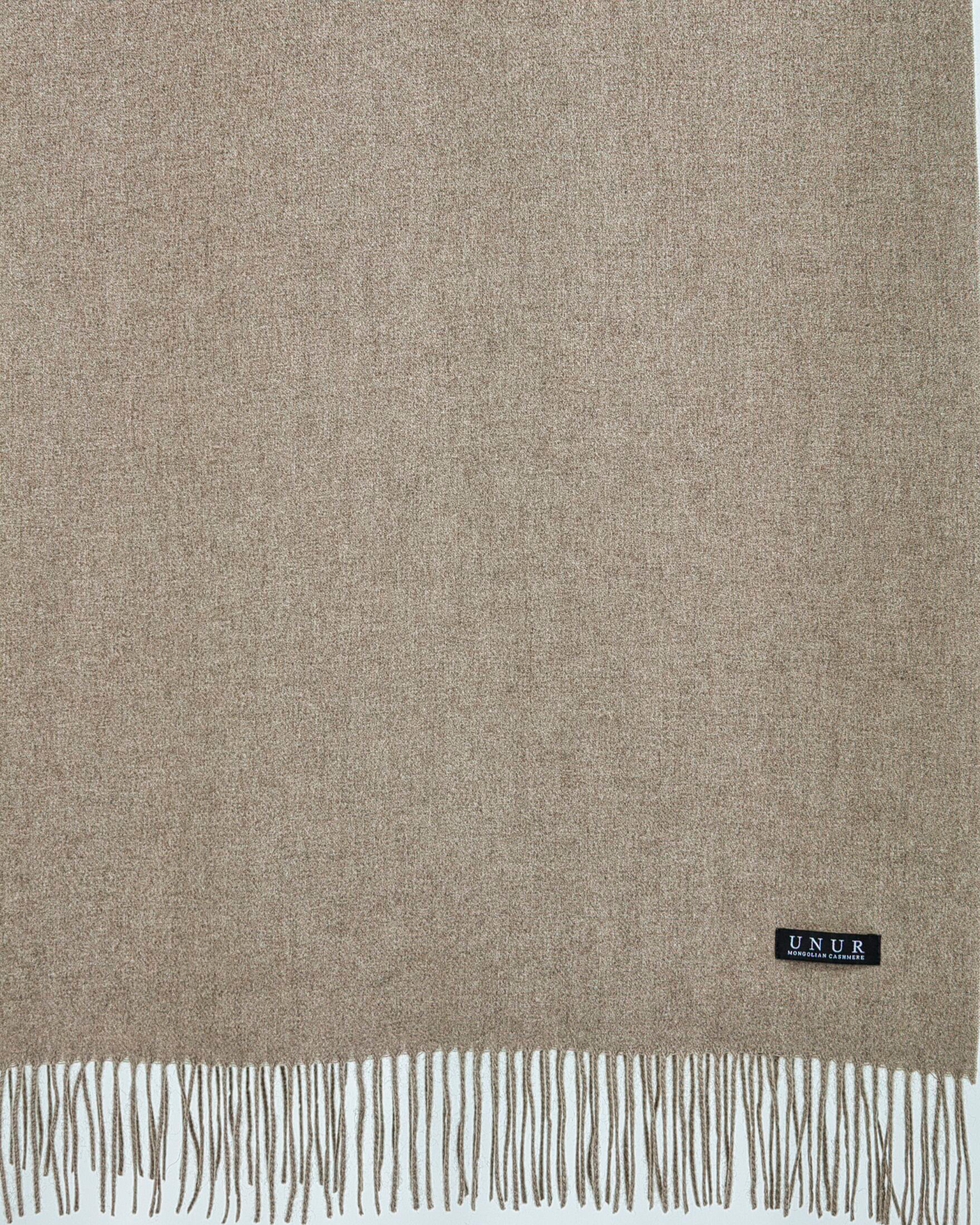 Close up of finely woven natural brown cashmere shawl
