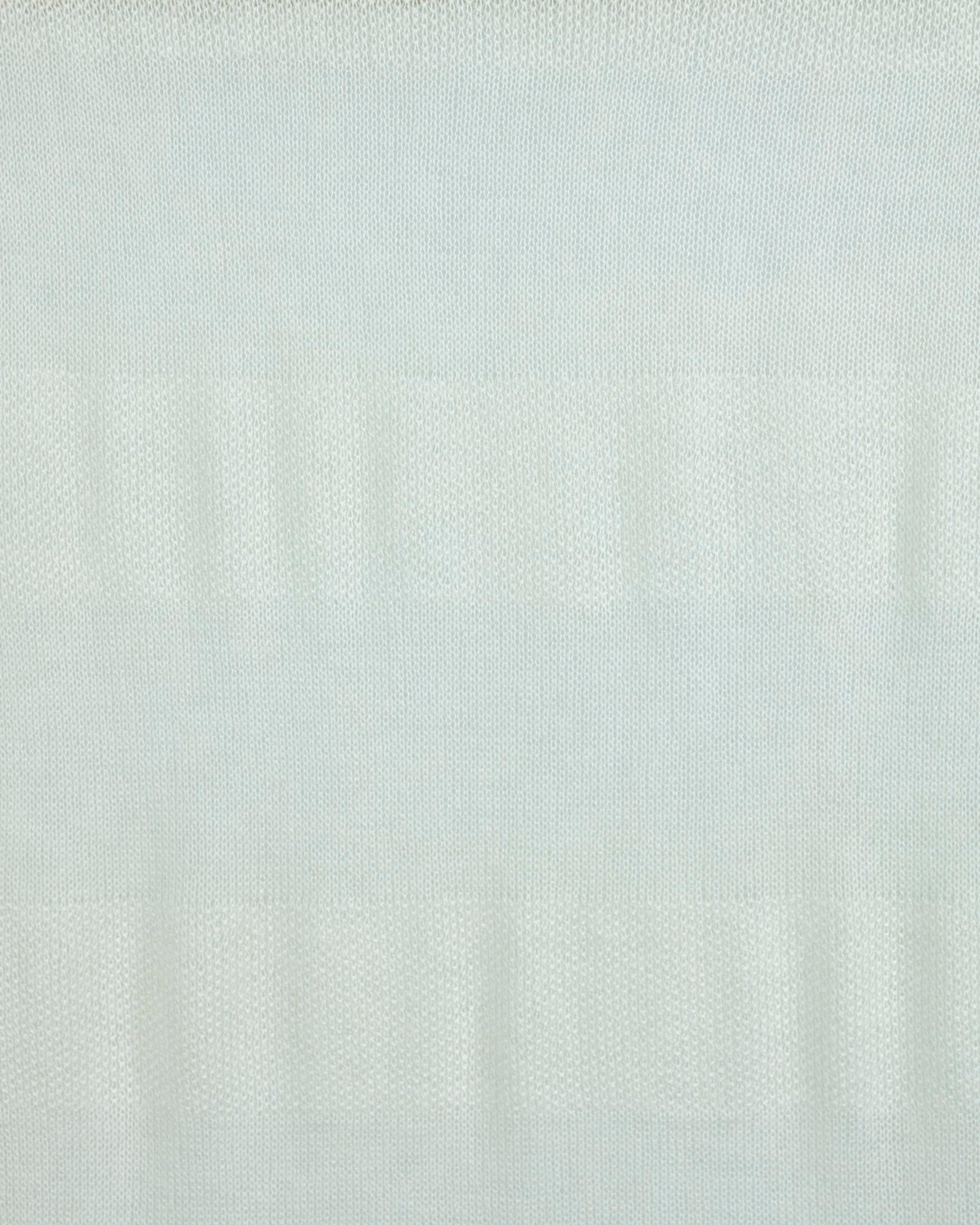 Close-up of soft cashmere shawl in white