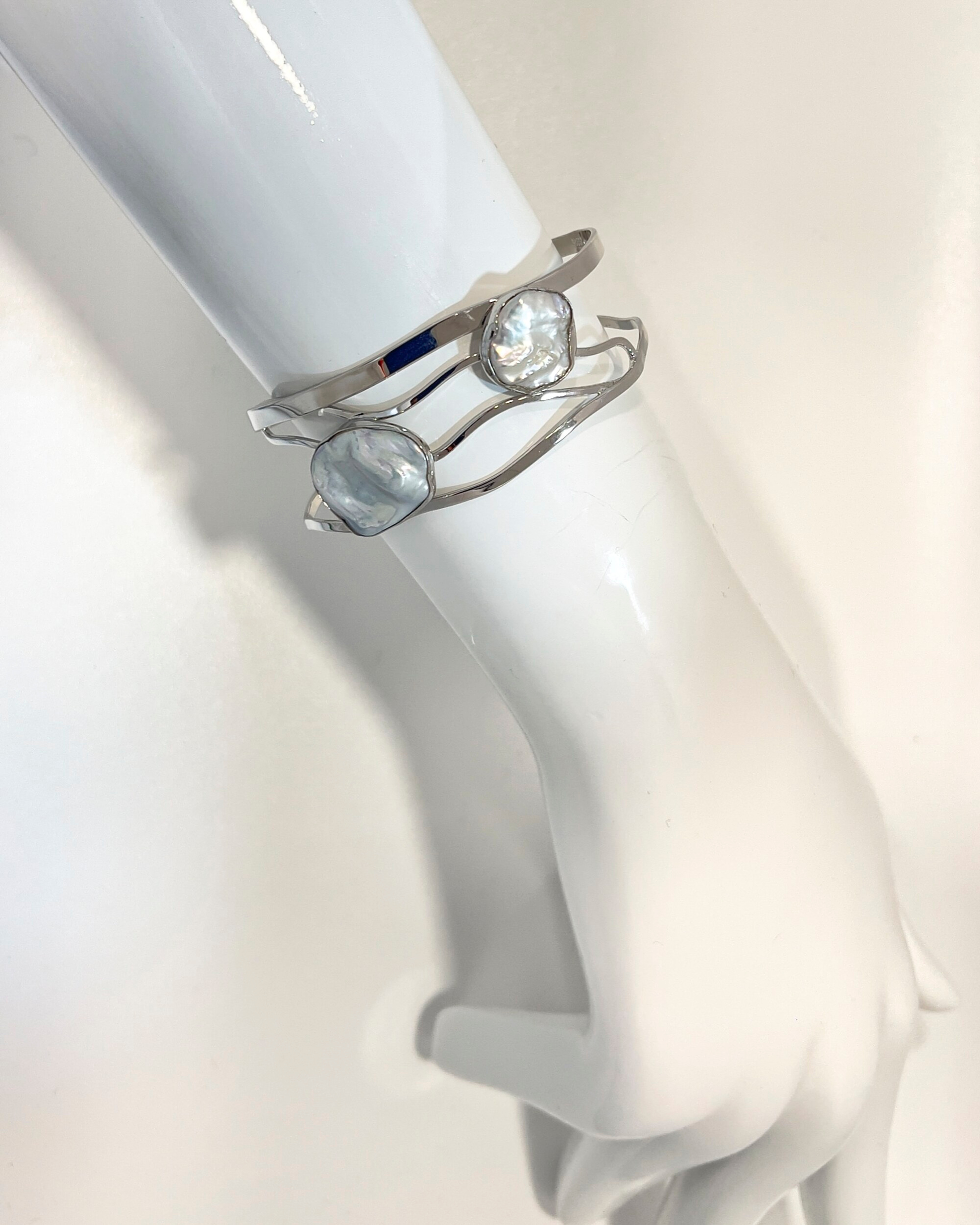 Signature Keshi Pearl Silver Lattice Bangle Bracelet with two keshi pearls in a rhodium-plated setting