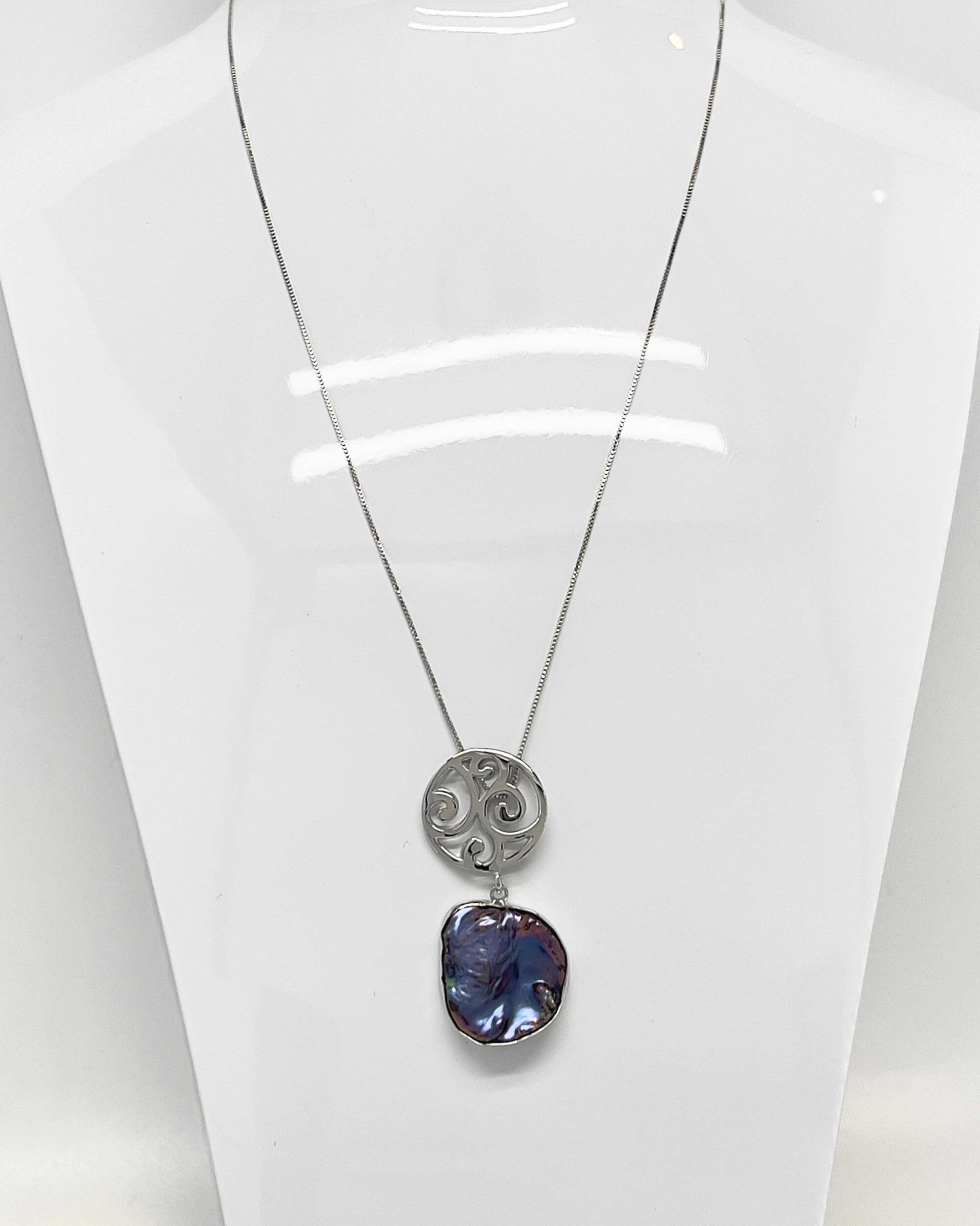 Unur Signature Pendant Necklace with a dark keshi pearl and a rhodium-plated silver charm