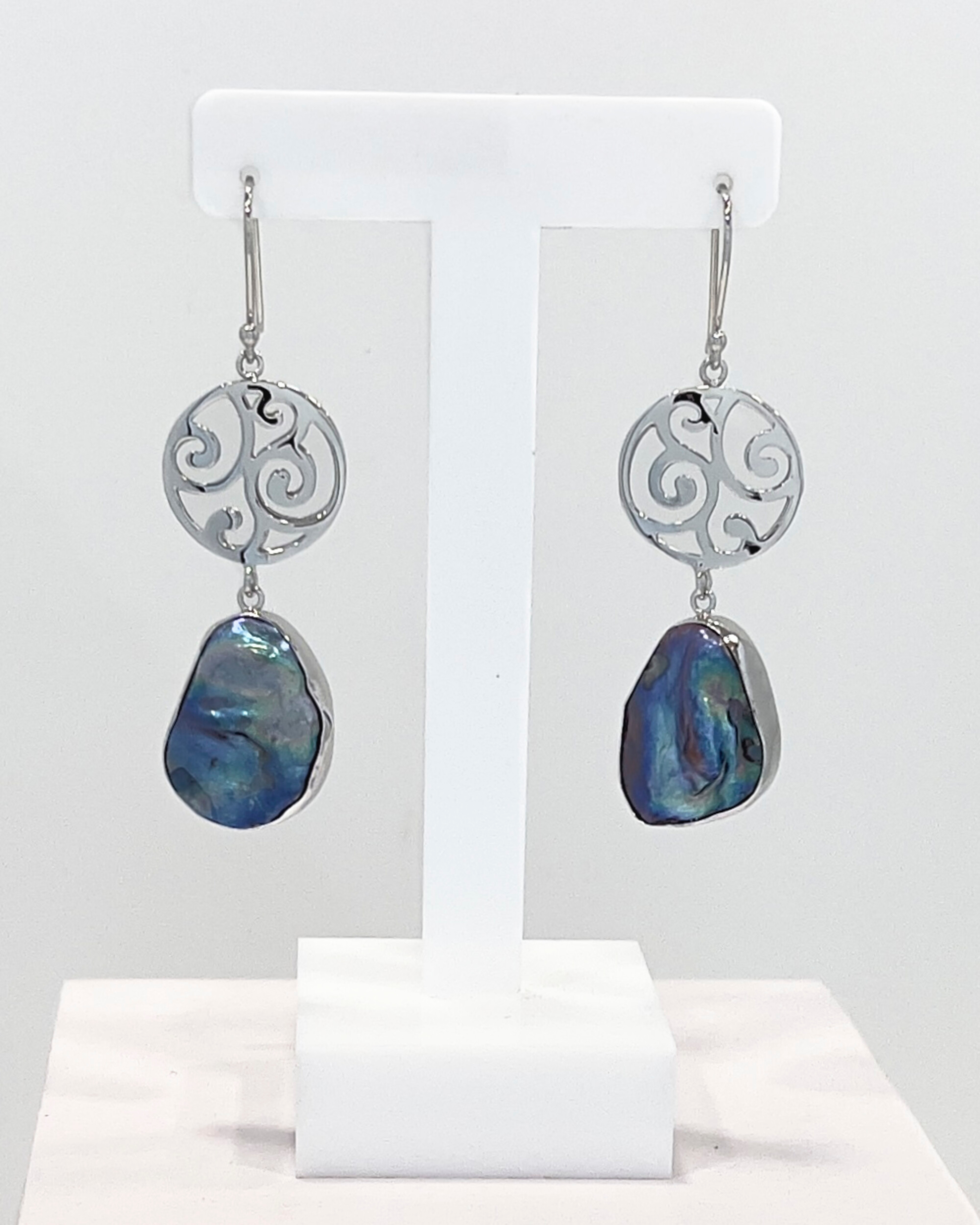 Signature dark Keshi pearl drop earrings with a round silver charm