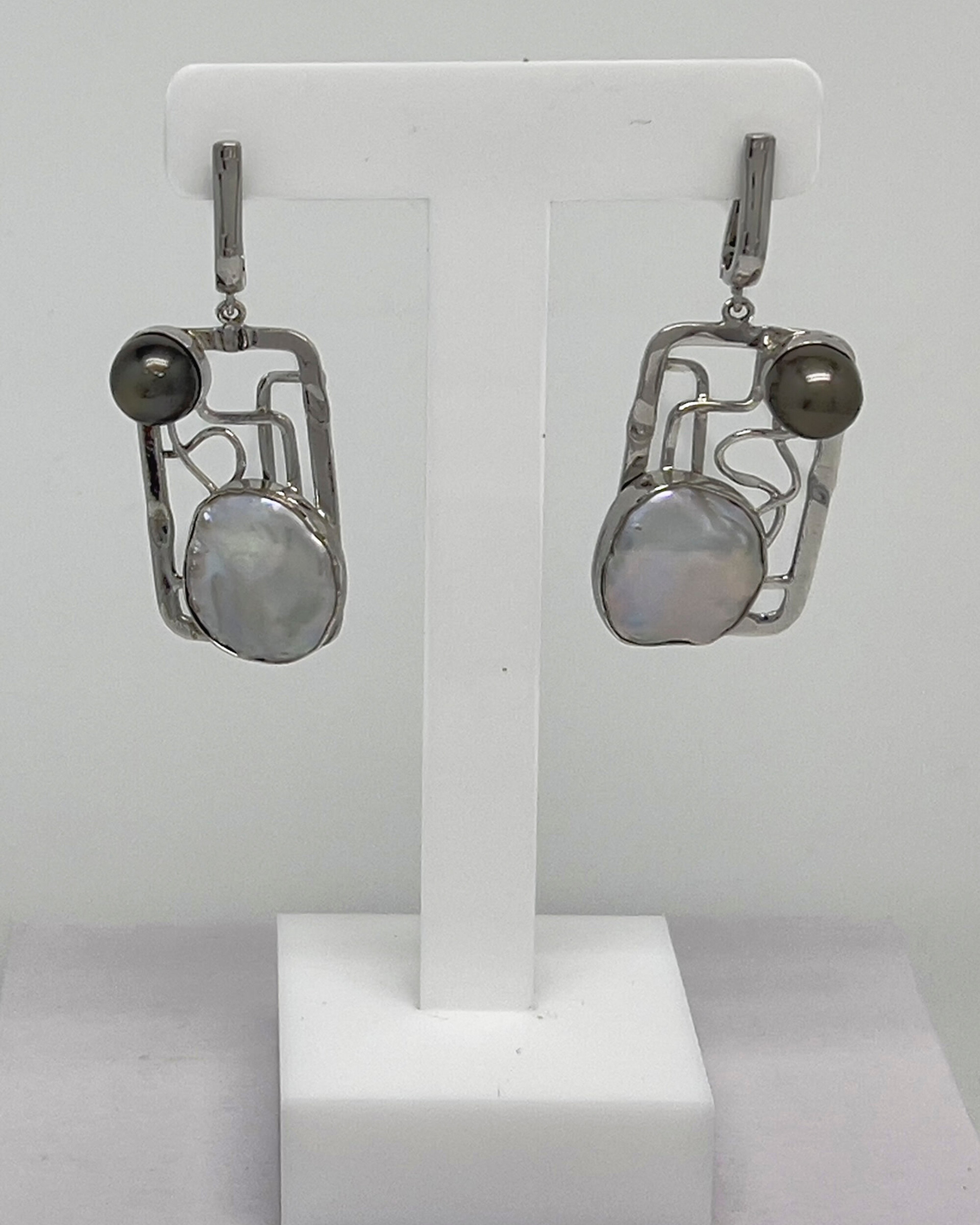 Signature drop earrings with Tahitian and Keshi pearls set in a square silver lattice design