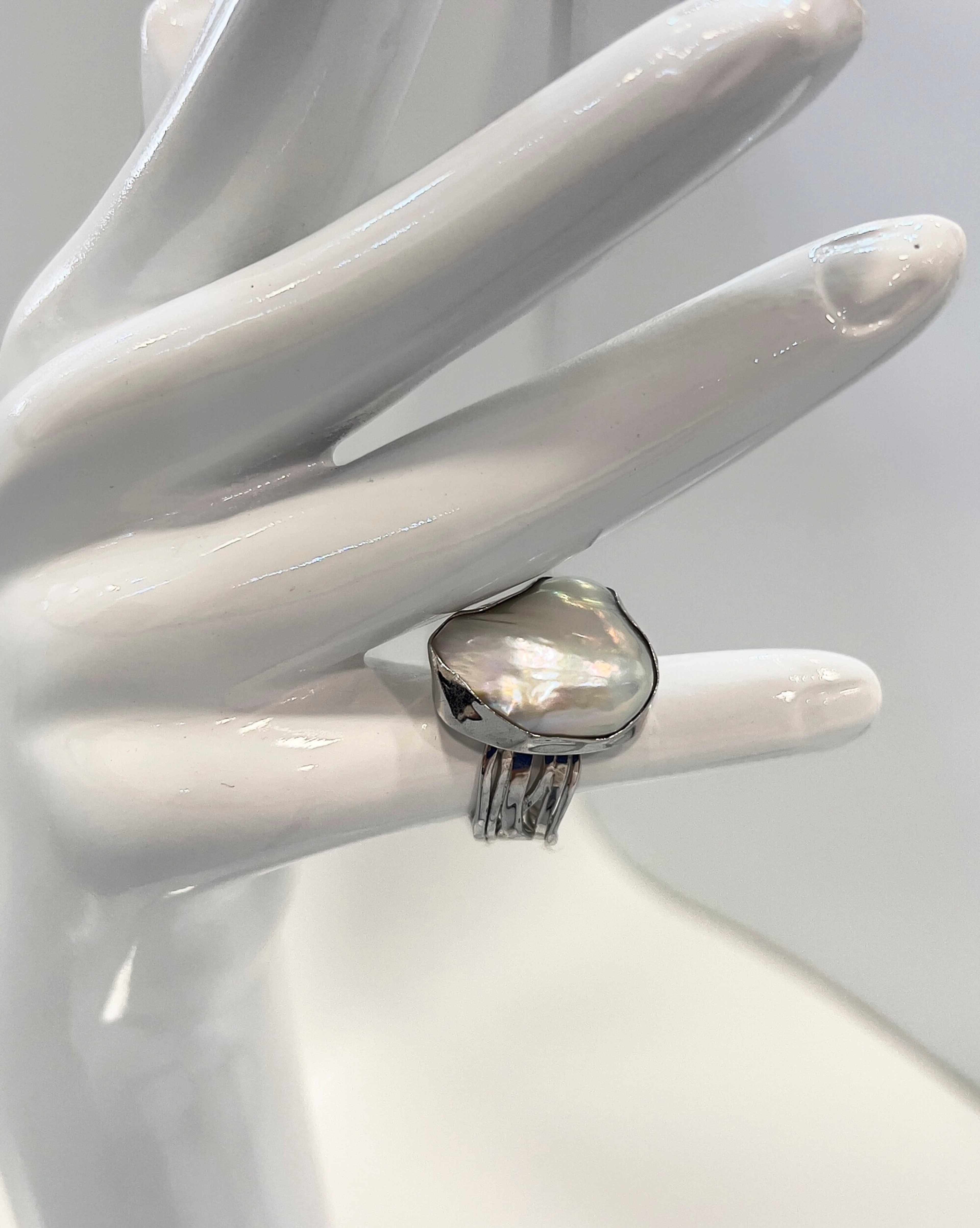 Signature large keshi pearl statement ring with a silver layered band