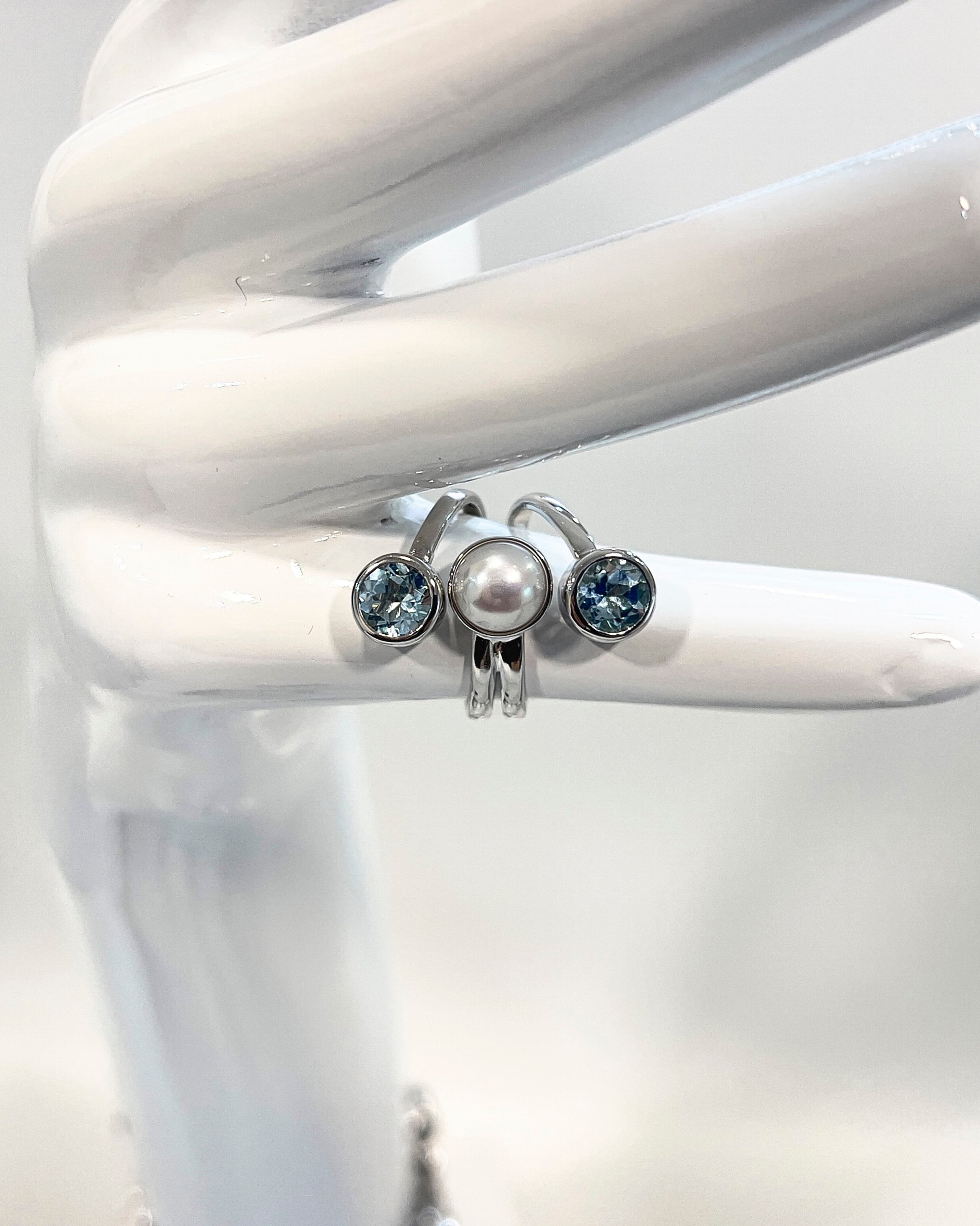 Signature round pearl and topaz statement ring with silver spiral band