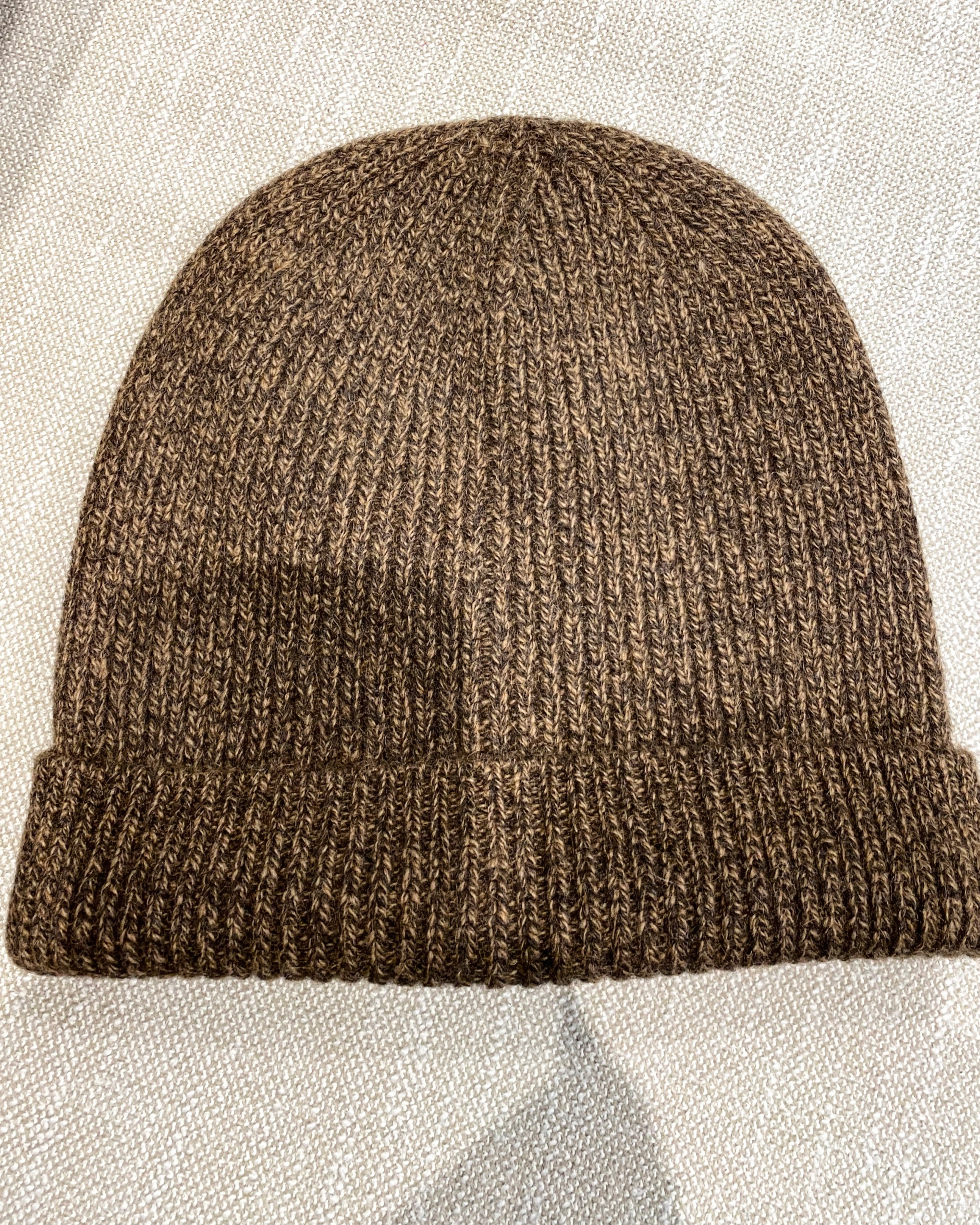 Unur ribbed yak wool hat in mottled orange brown