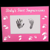 Pink babys first impressions photo frame with hand and foot print imprints